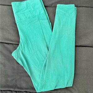 Athleta Teal Salutation Stash Tights